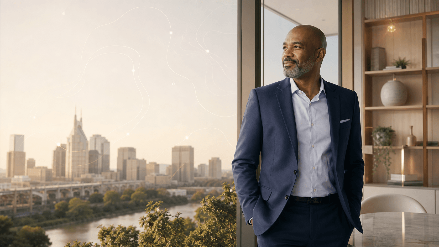 A business owner looking out over the city skyline, considering the risks behind what he has built